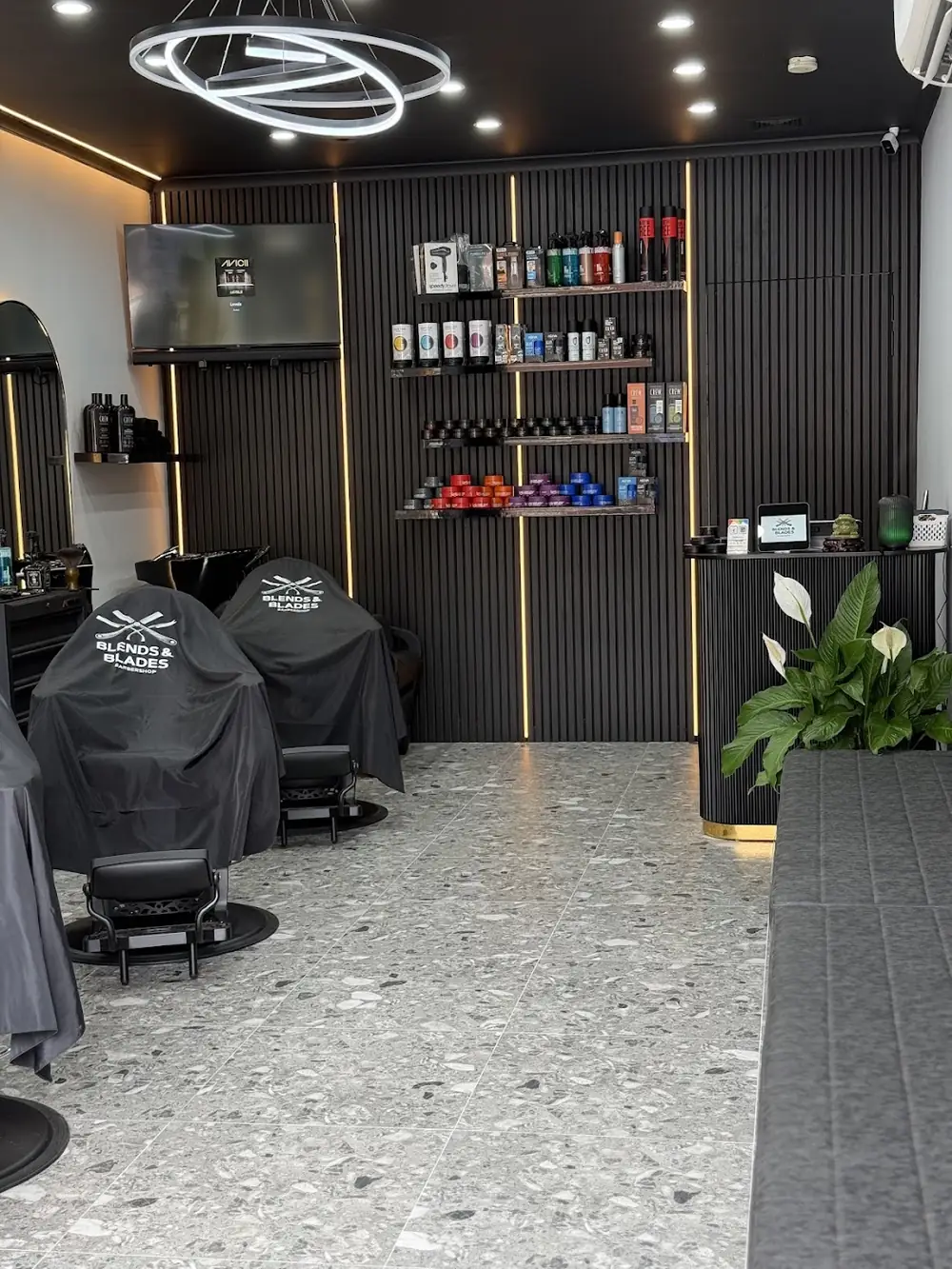 Barber chairs at Blends & Blades